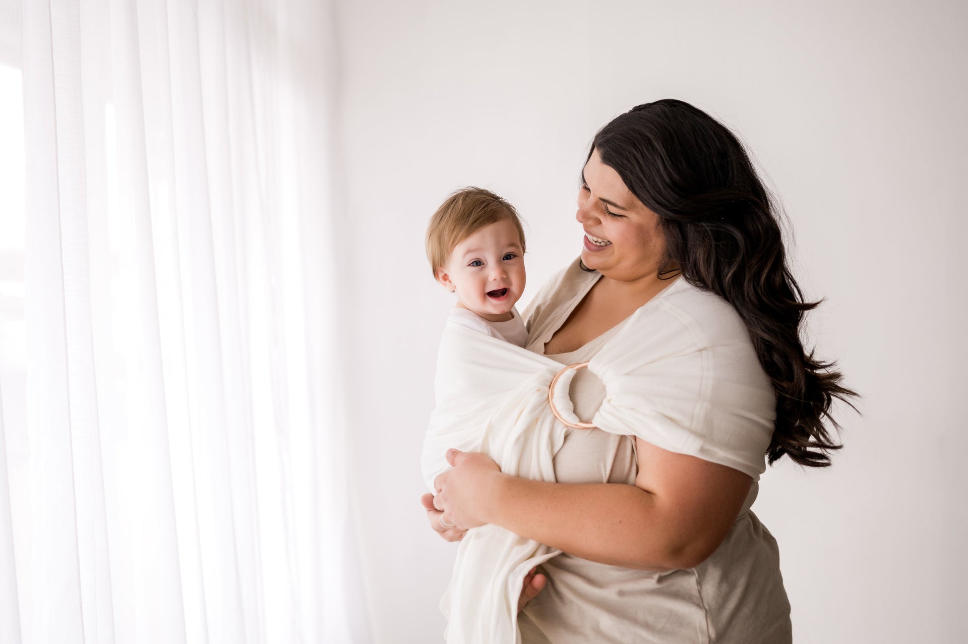 Held with love in the softest ring sling baby carriers! Handcrafted in the USA from Oeko-Tex certified and all natural fibers! Easy to use, flattering to all body types and ultra soft ready to use the moment they arrive home.